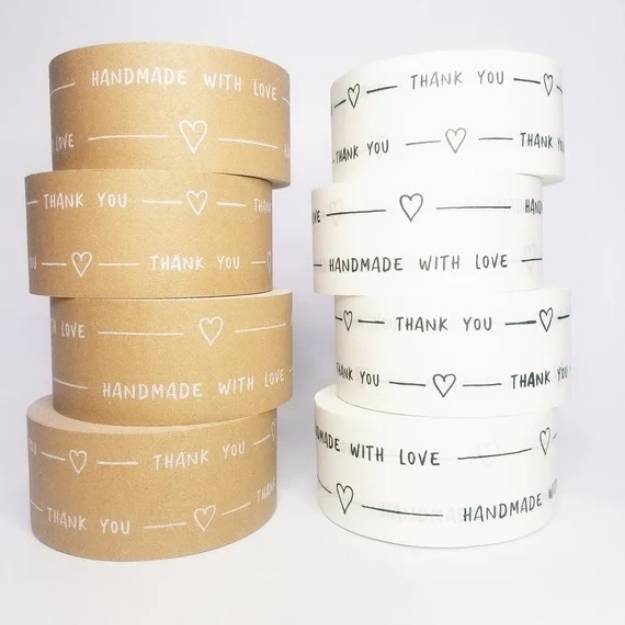 Custom Adhesive Tape Sticker Rolls – Creative Printing Dubai - Image 2